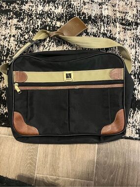 Leisure Traveler Black Canvas Messenger Bag with Brown Accents